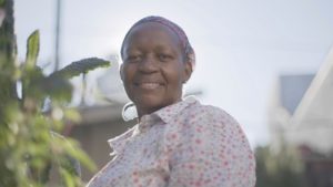 Above: Kele, community gardener at Williams Avenue Community Garden.