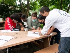 Above: Students from the Washington Heights Expeditionary Learning School (WHEELS) study samples taken from the salt marsh at Sherman Creek Park.